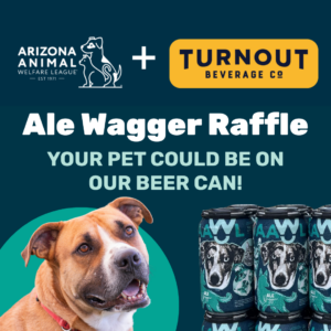 A dog playfully sticks its tongue out next to beer cans featuring the dog's image for a raffle.